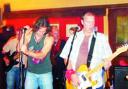 STAGE OF SUCCESS: Gareth Ainsworth (left) sings with his band Dog Chewed the Handle