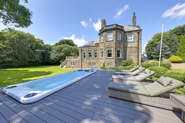 Lancashire Telegraph: Fancy a dip in the hot tub (Photo: Fine and Country)