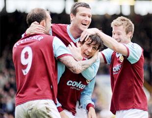 HEAD BOY: Jack Cork receives the praise after his first senior goal at Turf Moor on Sunday