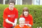WHEEL GO FAR: Mavis Pye with grandchildren Laura and Adam Tyson
