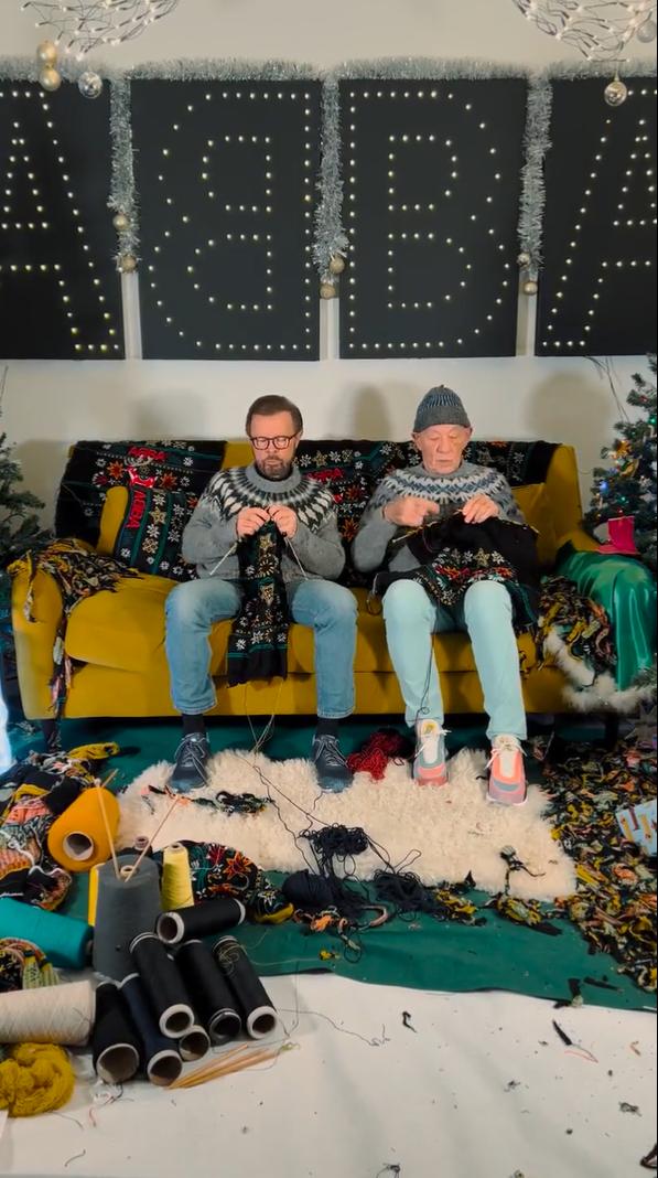 Lancashire Telegraph: Björn Ulvaeus and Ian McKellen knitting Christmas jumpers (Credit: @ABBAVoyage)