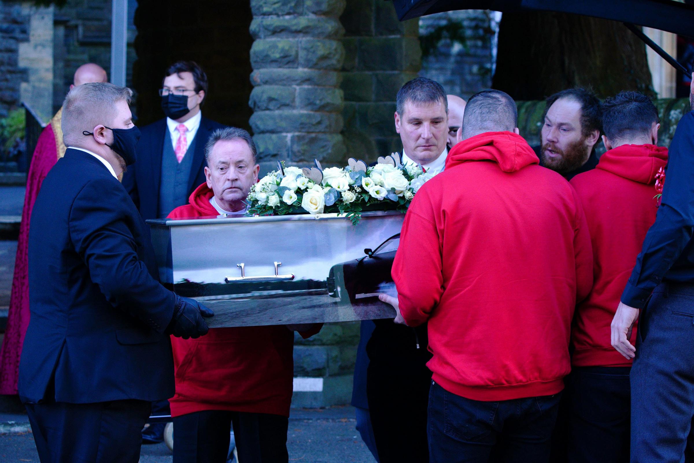 Car procession and mourners in red at funeral for boy mauled by dog - Vimarsana News