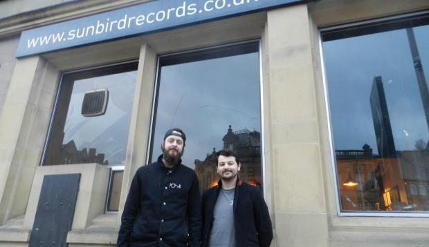 Lancashire Telegraph: Jonathan and Ramsay outside Sunbird Records in Darwen