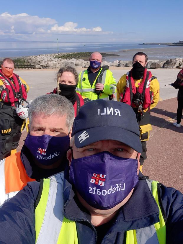 Lancashire Telegraph: Martyn Browitt with Morecambe RNLI crew, filming for ITV's The Bay (Photo:Martyn Browitt)