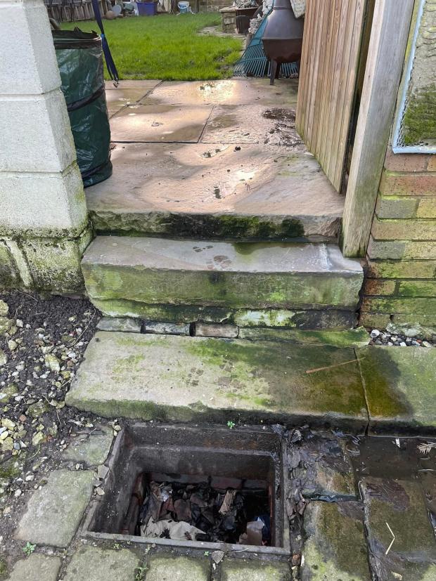 Lancashire Telegraph: Joanne Boardman "nearly fell down a hole" outside her Great Harwood home after metal grates were taken