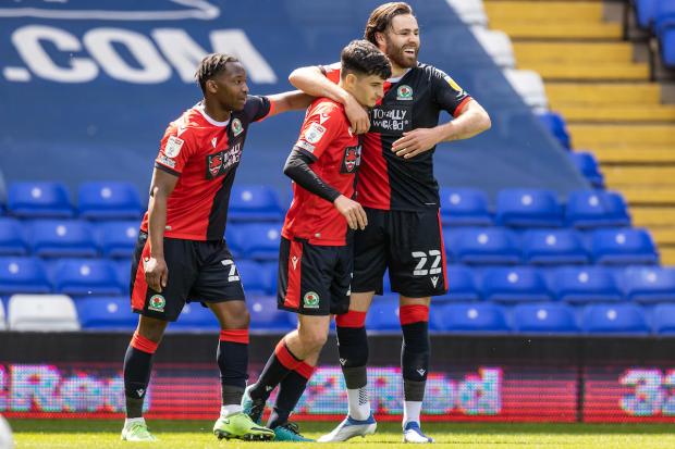 John Buckley celebrates opening the scoring for Rovers
