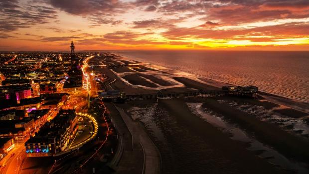 Lancashire Telegraph: Sunset at Blackpool beach. Picture: Parkdean