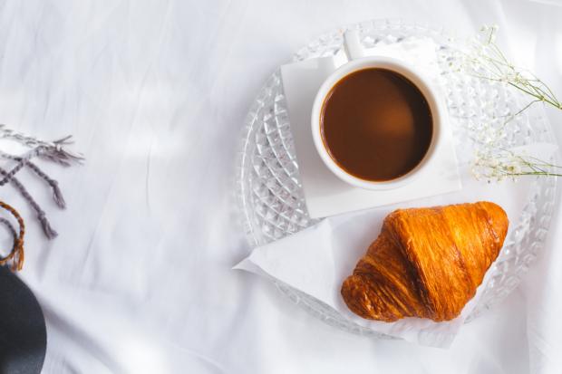 Lancashire Telegraph: A croissant and a coffee (Canva)
