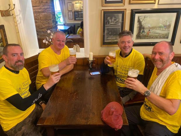 Lancashire Telegraph: Punters enjoying a pint on a previous pub walk