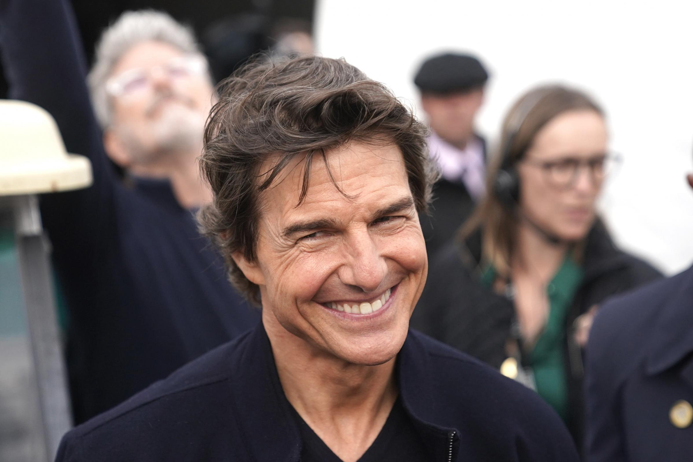 Tom Cruise menantikan untuk tampil di acara itu untuk menghormati era Ratu
