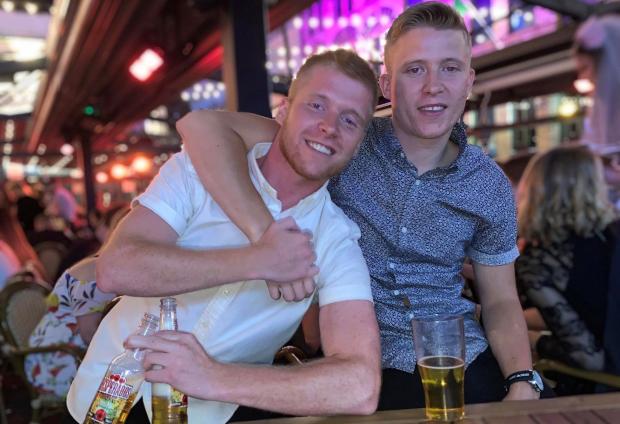 Lancashire Telegraph: Elliott, left, with his brother Tomas