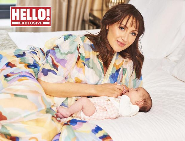 Lancashire Telegraph: Catherine Tyldesley with her baby daughter Iris as they appear in this week's edition of the magazine. Credit: Hello! Magazine/PA