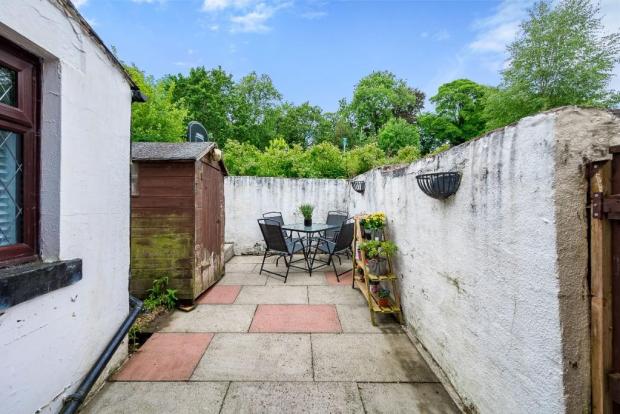 Lancashire Telegraph: The paved garden area to the rear. Photo credit: Wainwrights / Rightmove