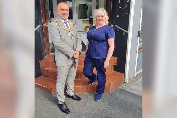 Nicola Kenny with the Mayor of Bolton, Cllr Akhtar Zaman, at the official opening of her body treatment salon in Bolton town centre