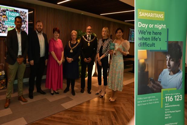 Samaritan volunteers and local authority celebrate 50 years of help and support