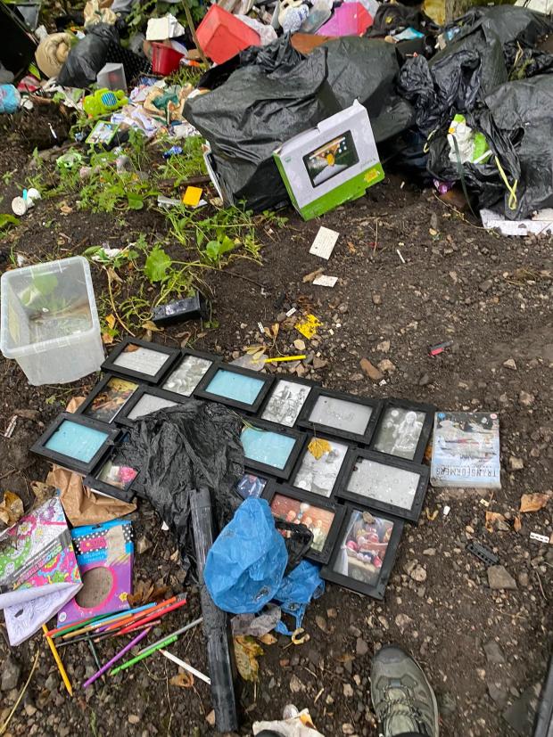 Lancashire Telegraph: Photo of picture frames dumbed at nature reserve. Source: Facebook