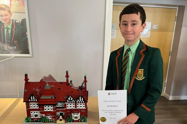 Joel Bradshaw, 13, spent six months creating the model of his school with Lego bricks