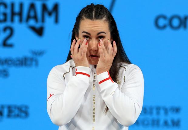 Lancashire Telegraph: Sarah Davies gets emotional after winning weightlifting gold in Birmingham (Bradley Collyer/PA)