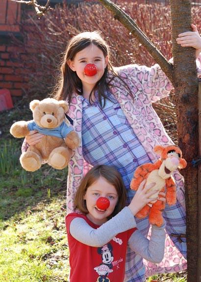 Pupils at Avondale Primary School in Darwen Alyssa Irvine and Jessica Regan wear their pyjamsas for the day.