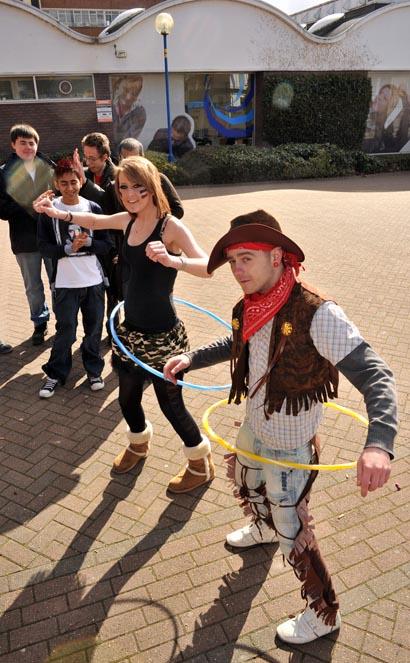 Youth workers at Blackburn College, Luke Isherwood and Sarah Belshaw in 'cock-a-hoop' outside the college.