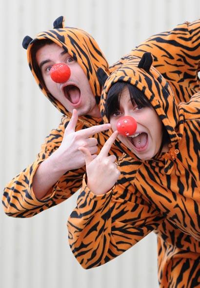 Will Pickles and Sian Wittaker of Daisy Communications in Nelson wear Tiger costumes for the day.