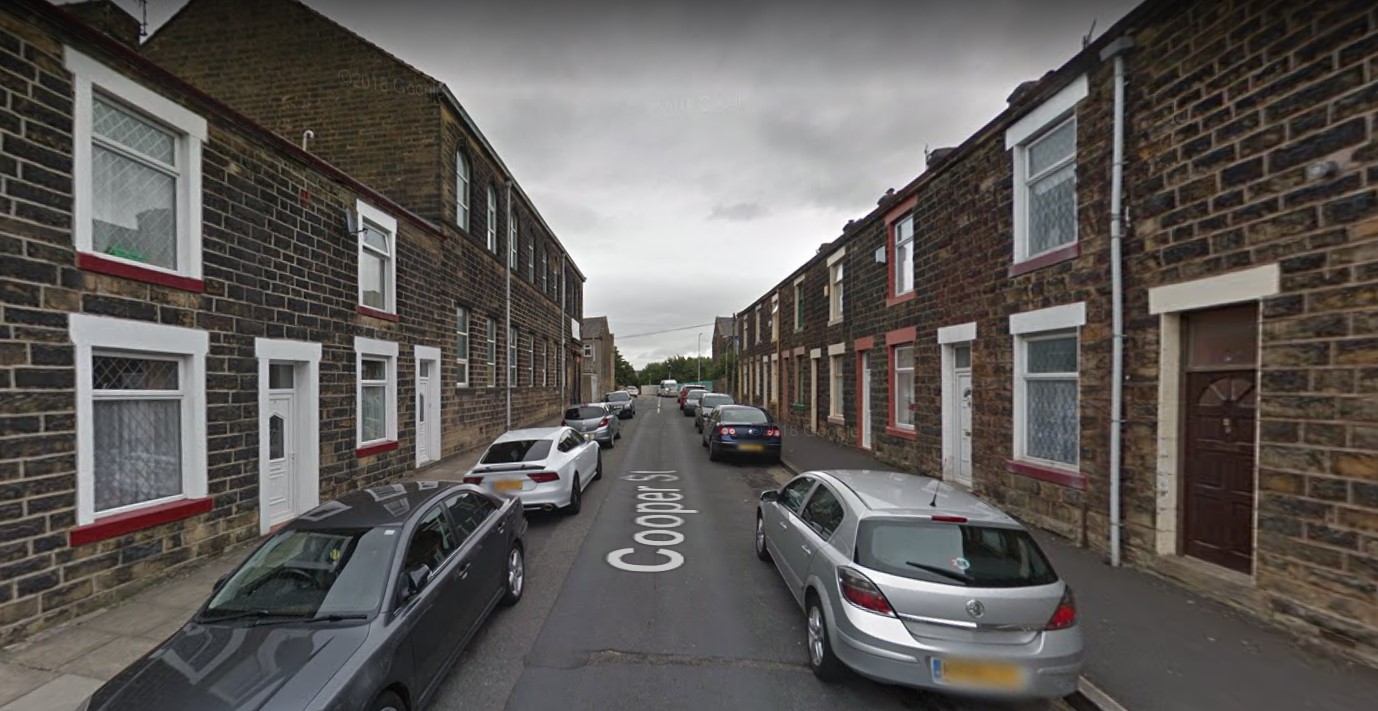 Man arrested after woman dies following Nelson house fire