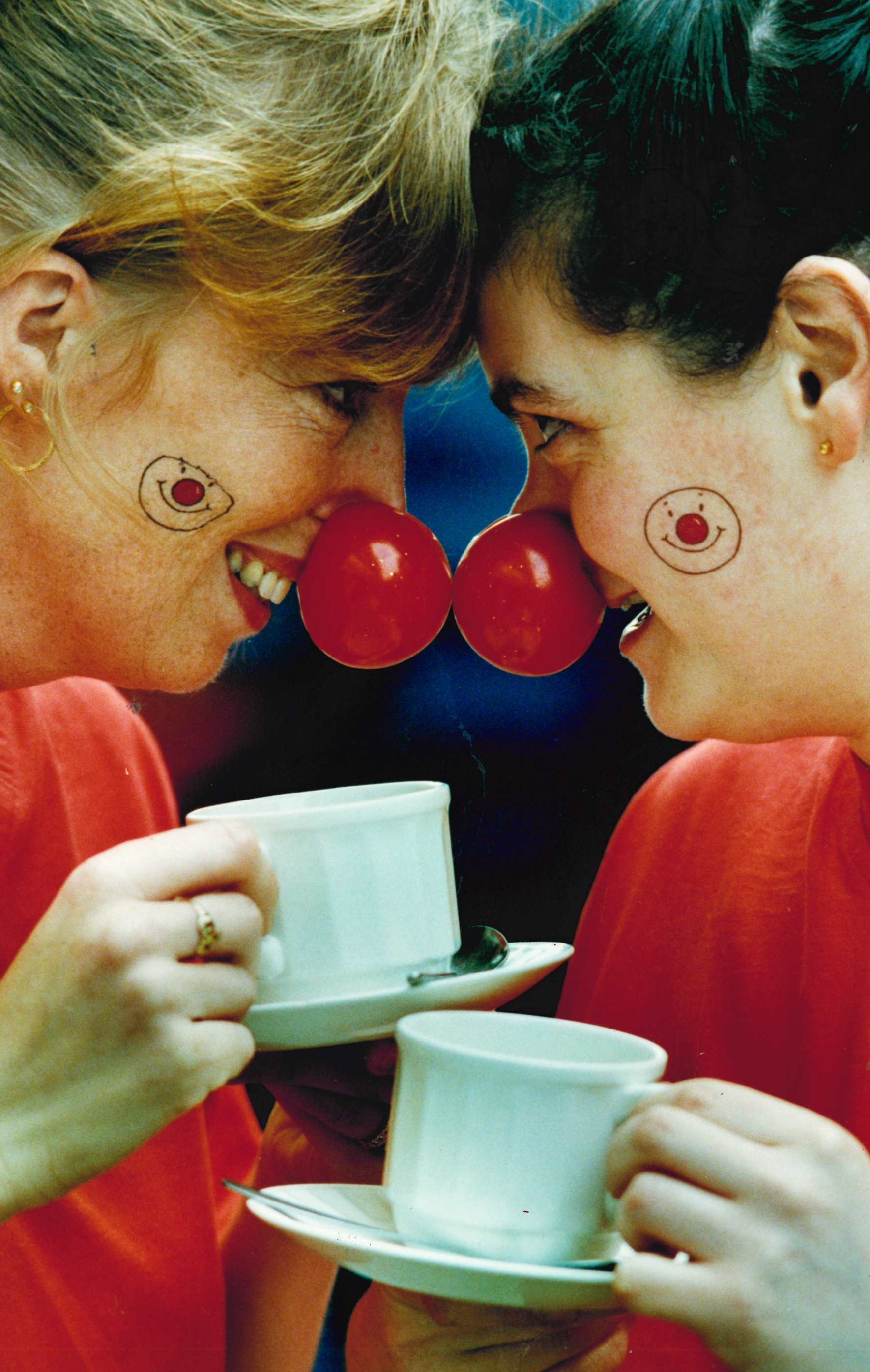 Clare Boyce, owner of the Piano Cafe in Blackburn and Jean Tommany celebrate Red Nose Day 1999