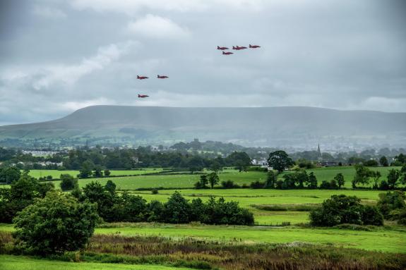 Lancashire Telegraph: Red Arrows flying by Pendle Hill Lancashire Telegraph: Red Arrows flying by Pendle Hill