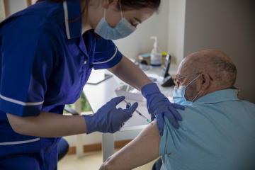 Blackburn with Darwen residents Covid and flu jabs call