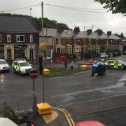 Blue car flips onto its side in Whalley New Road, Blackburn. Picture credit Beryl Smith