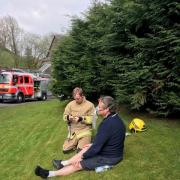 Ted Robbins receives treatment following a tumble drier fire at his house in April