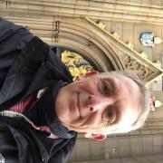 Rev. Jonathan Carmyllie outside the West Door of Blackburn Cathedral at the end of his pilgrimage