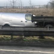 Van crashes in A56