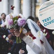 Police have broken up a wedding reception in Blackburn. Stock photo of a wedding with a covid-19 test inset.