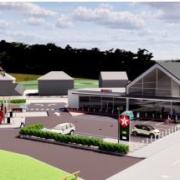 Artist impression of the new scheme for service station on former Windmill Hotel
