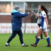 Manager Gemma Donnelly and midfielder Tash Fenton at the final whistle against Liverpool. Credit: KIPAX