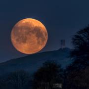 Landmark: The almost full moon behing Blacko Tower was captured by photographer Lee Mansfield