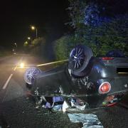 Driver arrested  on suspicion of drink-driving after car crashes into lamp post