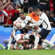 England's players celebrate Harry Kane's goal to put them into the Euro final.