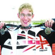 DOUBLE JOY: Graeme Ballard with his medals. Picture: Brian Derbyshire