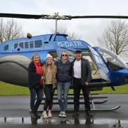 Dave Fishwick took Laura Nutall for a ride in his helicopter, helping to tick off another item on her bucket list. Pictured here with mum, Nicola and sister Gracie.