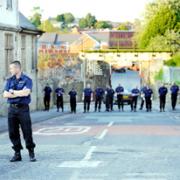 PAINSTAKING: Police search the area around Willow Street, Blackburn