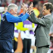 FAB WIN: Fabio Capello celebrates England’s progression to the last 16 with goalkeeping coach Franco Tancredi