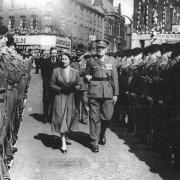 The Queen walking on King William Street during her visit to the town in 1955
