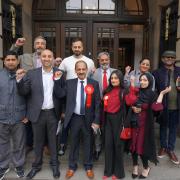 Labour candidates and supporters celebrate on the steps of King George's Hall, Blackburn today (Thursday May 5)