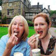 TUCKING IN: Amanda Dowson, left, and curator Fiona Jenkins sample the new coltsfoot rock ice cream created especially for Turton Tower