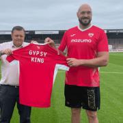Head of commercial for Morecambe FC Martin Thomas with Tyson Fury