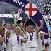 England's female football team celebrate with the trophy following Sunday’s victory over Germany in the Euro 2022 final (Photo: Danny Lawson/PA)