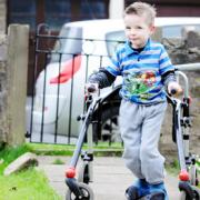 TREATMENT: A revolutionary operation could see Robin Carter walking unaided for the first time