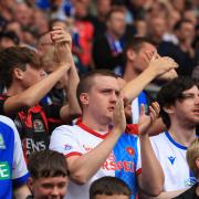 FAN GALLERY: Rovers supporters watch on against Bristol City